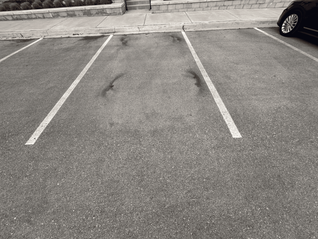 This is a simple parking lot stall at a senior active living center in Overland Park. These stalls are as simple as they get but they fade fast.